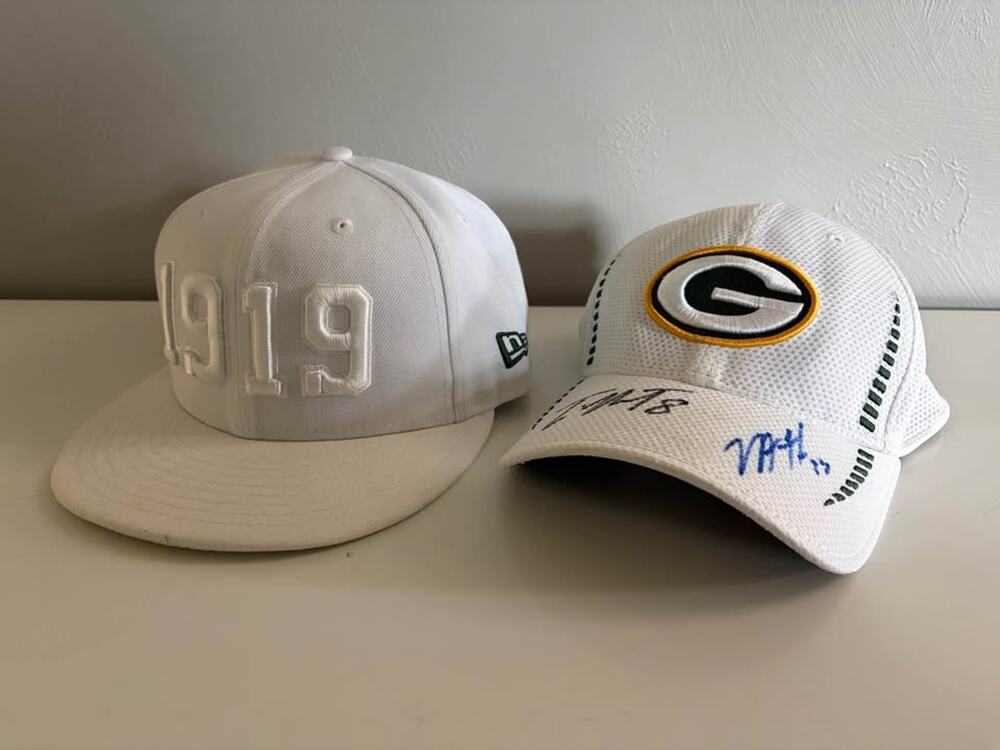 Lot 2 Greenbay Packers hats, white. Autographed. (0173)